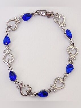 Silver Heart Link Bracelet with Sapphire Blue Teardrop Stones